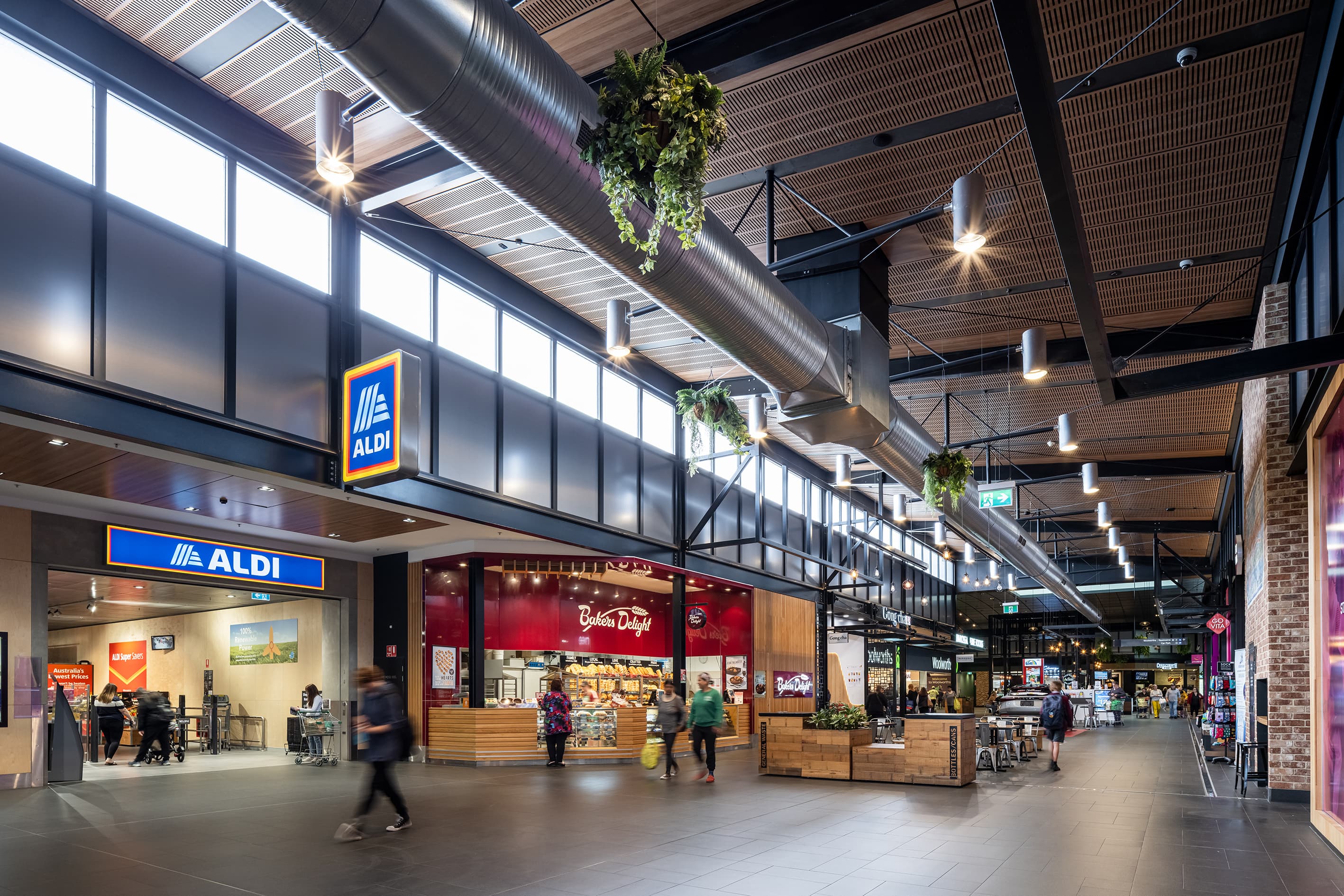 An Aldi storefront in a shopping centre with industrial design