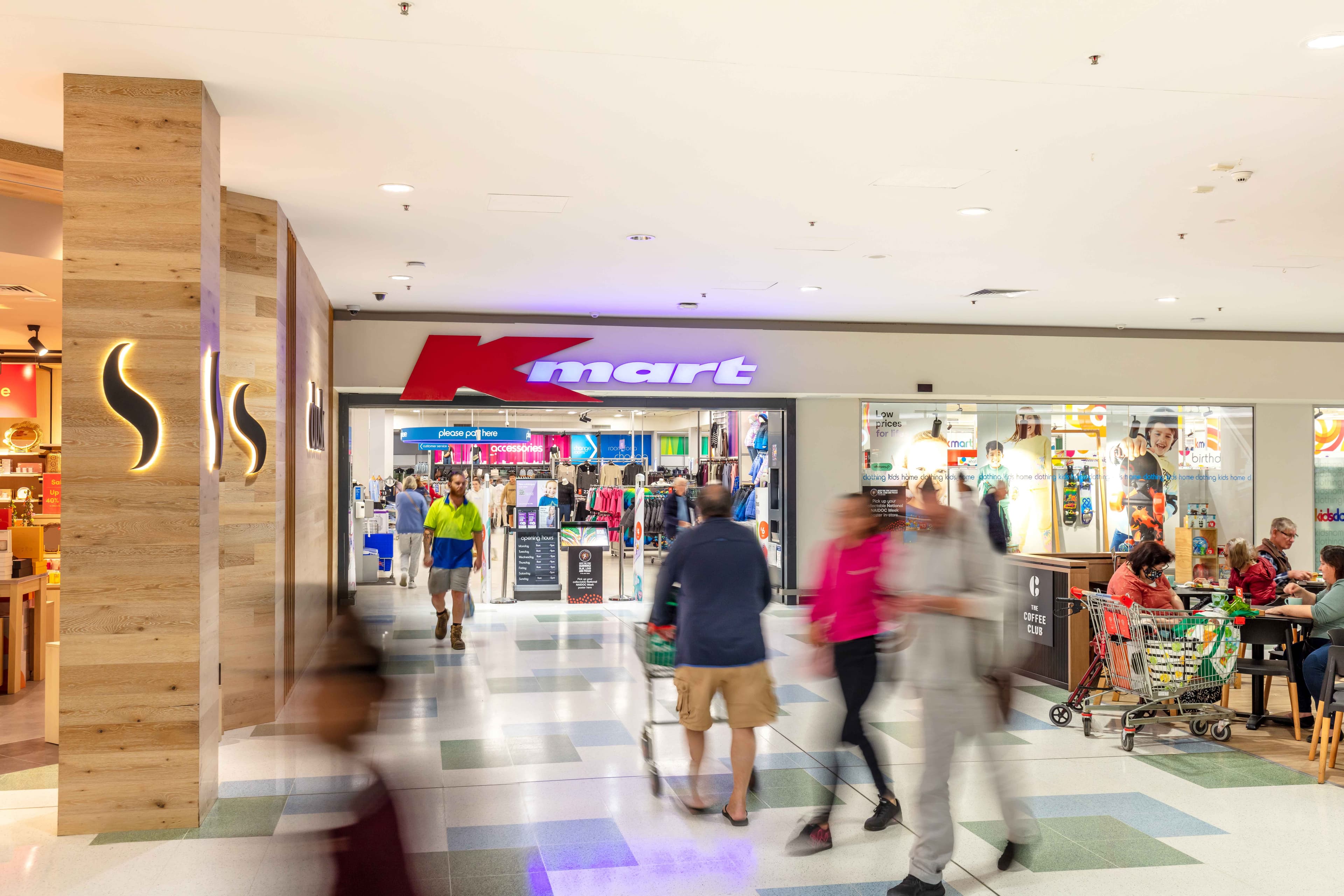 People walking through mall in centre